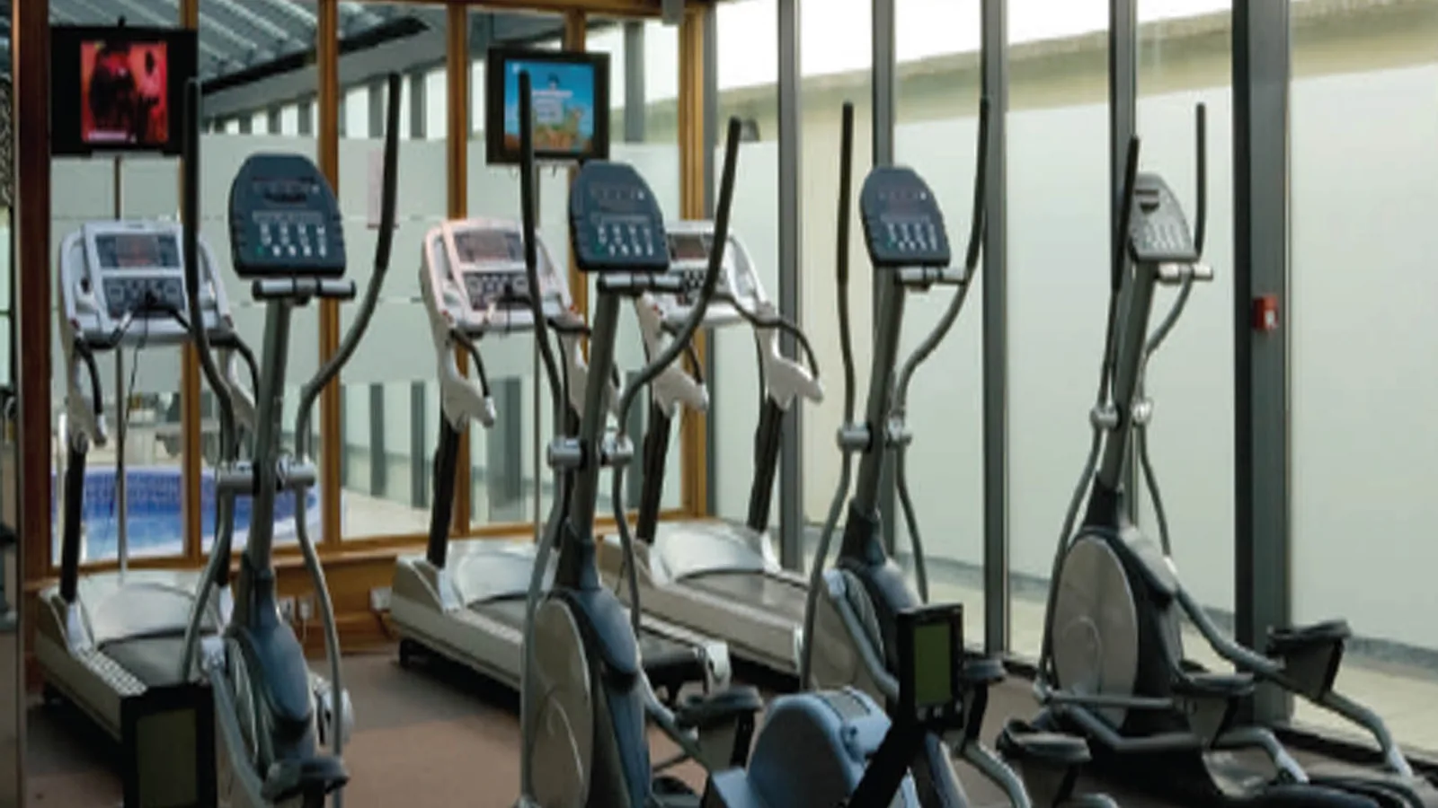 Gymnasium with cardio equipment at ATS Happy Trails