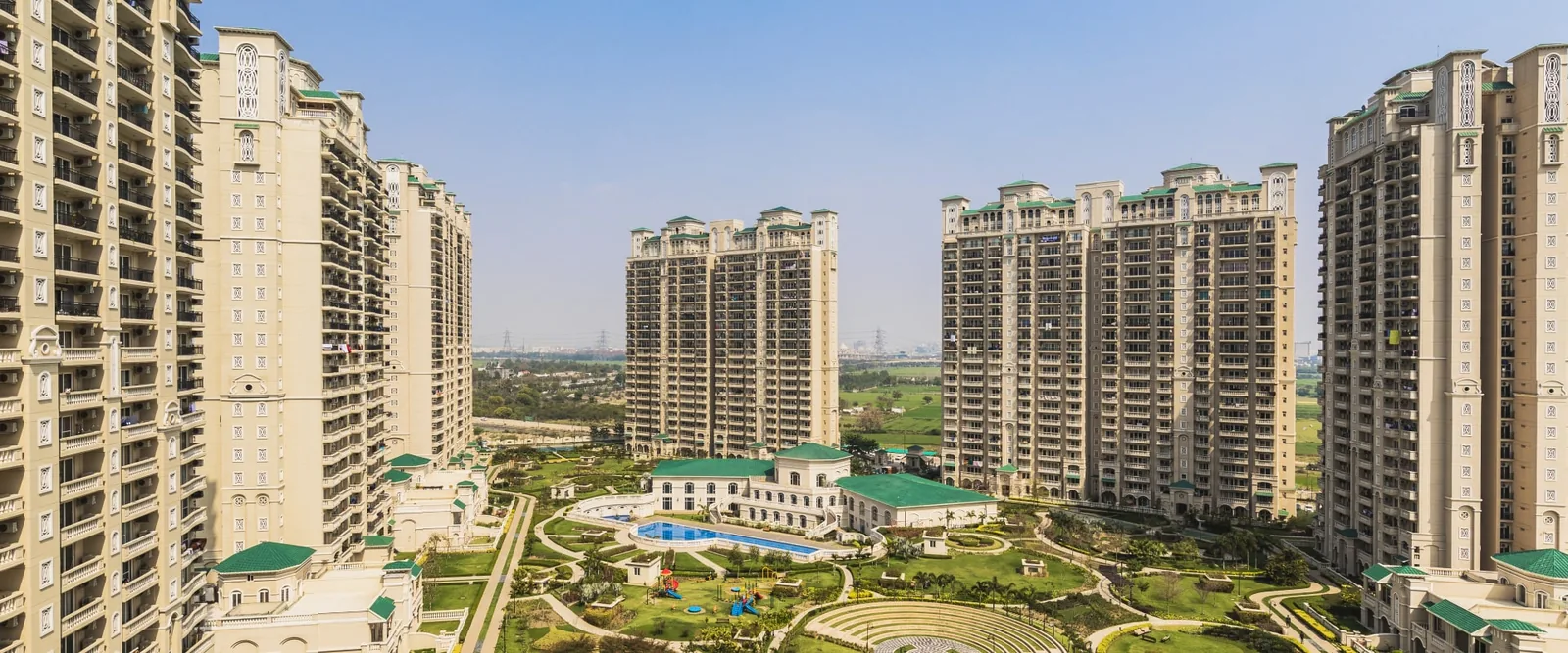 Wide view of the ATS Pristine complex with the clubhouse at the centre
