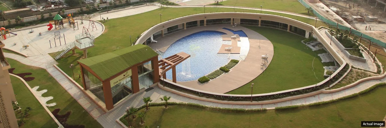 The pool and deck at Gaur Saundaryam from above