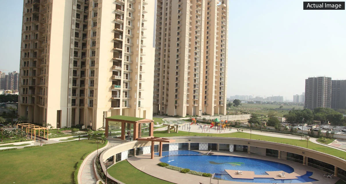 Gaur Saundaryam towers seen across the swimming pool