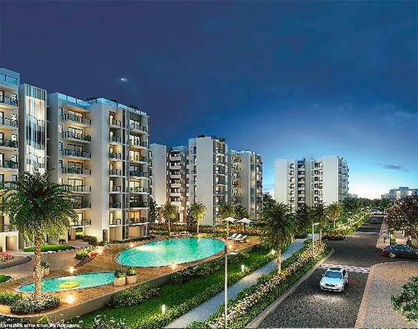 Apartment blocks and the pool at Godrej Golf Links