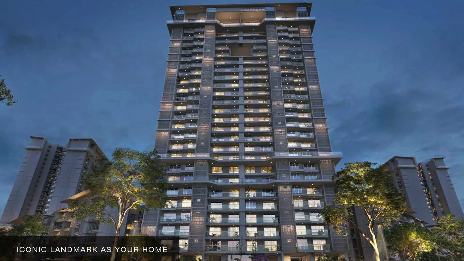The iconic tower at Godrej Palm Retreat lit at night