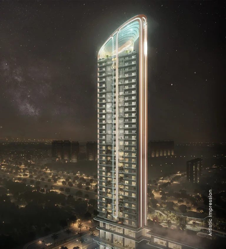 A tower of M3M Jacob & Co Residences against the night sky